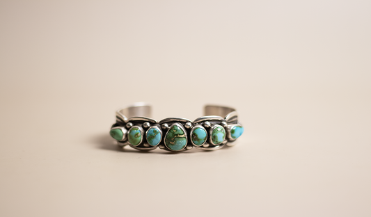 7 Stone Tear Drop Sonoran Gold Cuff