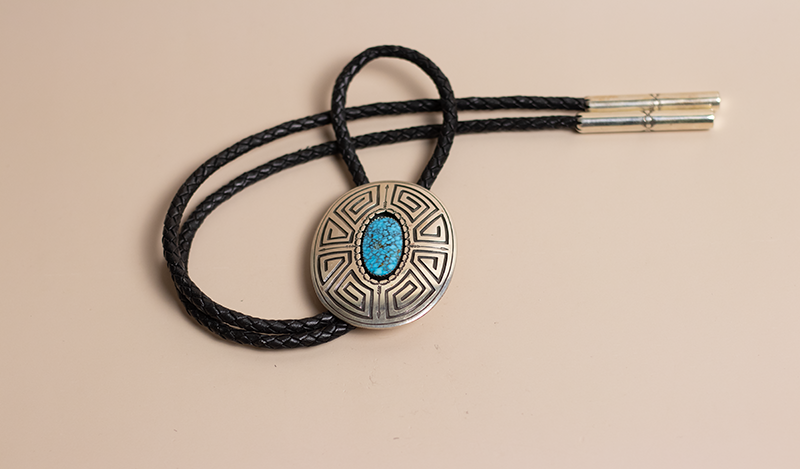 Spiderweb Kingman Bolo Tie