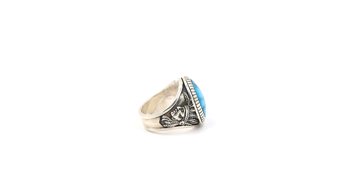 Large Oval Spiderweb Turquoise Ring w/ Chief Motifs